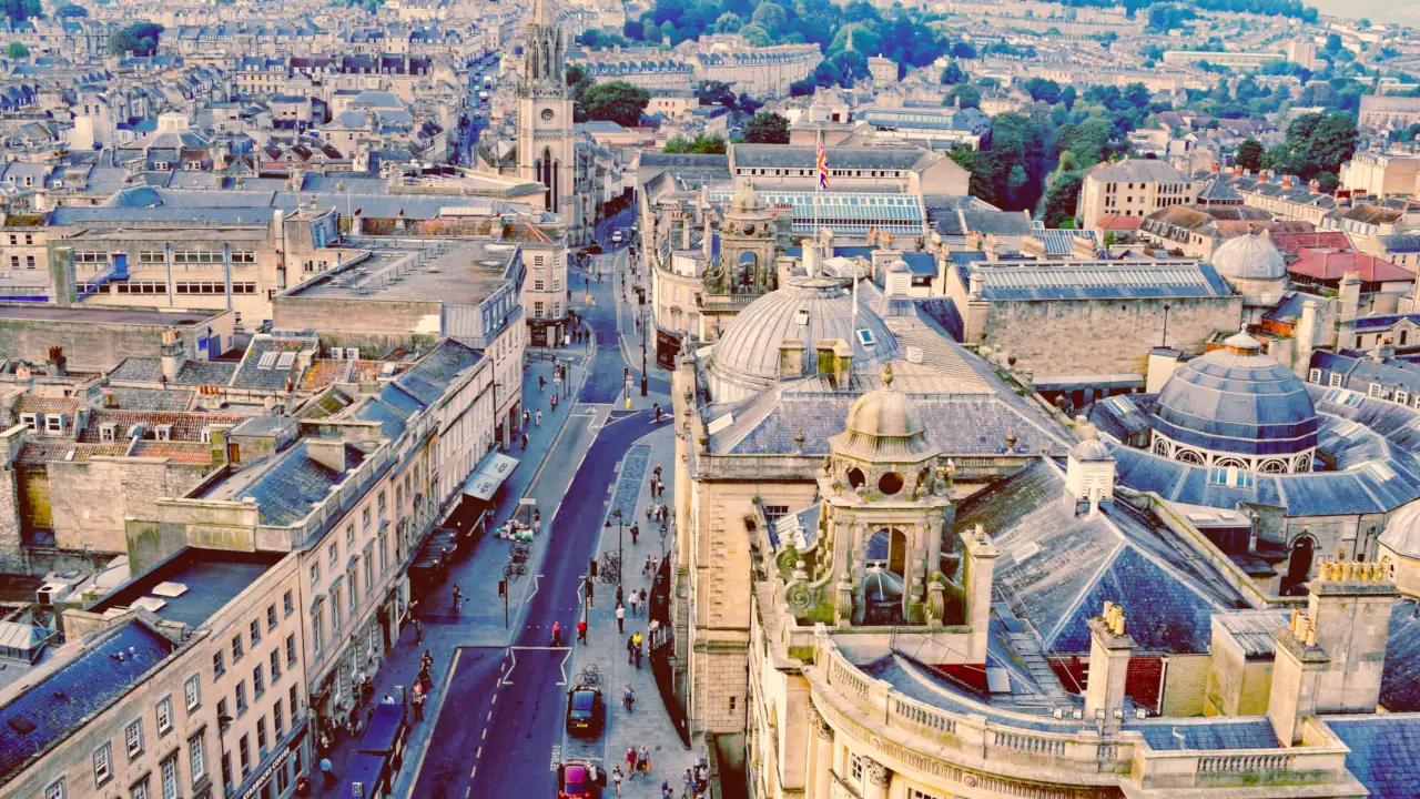 A stunning aerial view of Bath, England showcasing its historic architecture and bustling streets